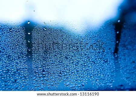 Water drop background surface texture, with shallow depth of field - blurry into the distance