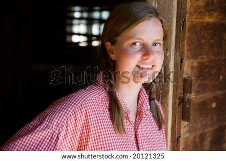 A farm girl worker taking a break