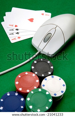 Online casino concept with mouse, cards and casino chips