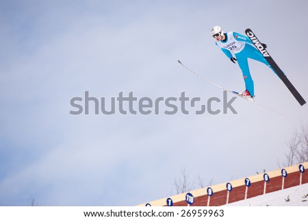VIKERSUND, NORWAY - MARCH 15: Christian Ulmer of Germany competes in the FIS World Cup Ski Jumping Competition on March 15, 2009 in Norway.