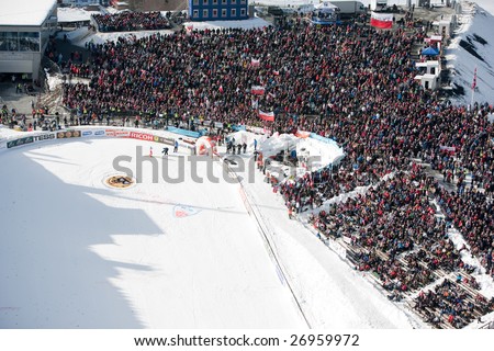 VIKERSUND, NORWAY - MARCH 15: Crowd cheering at the FIS World Cup Ski Jumping Competition.