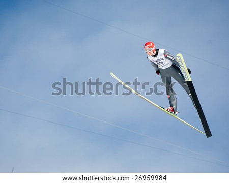 VIKERSUND, NORWAY - MARCH 15: Felix Schoft of Germany competes in the FIS World Cup Ski Jumping Competition on March 15, 2009 in Norway.