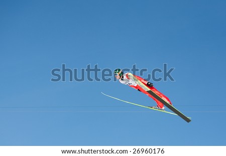 VIKERSUND, NORWAY - MARCH 15: Third place winner Dimitry Vassiliev of Russia competes in the FIS World Cup Ski Jumping Competition on March 15, 2009 in Norway.