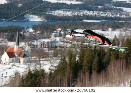 VIKERSUND, NORWAY - MARCH 15: Robert Kranjec of Slovania competes in the FIS World Cup Ski Jumping Competition on March 15, 2009 in Norway.