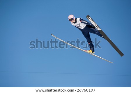 VIKERSUND, NORWAY - MARCH 15: Michael Neumayer of Germany competes in the FIS World Cup Ski Jumping Competition on March 15, 2009 in Norway.