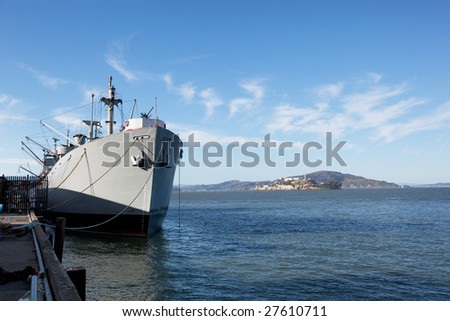 A war ship at dock in the open ocean