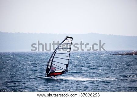 A wind surfer on the ocean