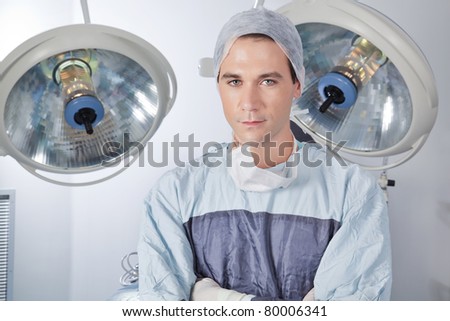 Close-up portrait of confident young male doctor