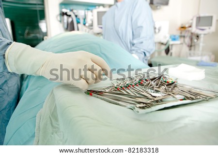 A detail image of sterile surgery instruments in an operation room