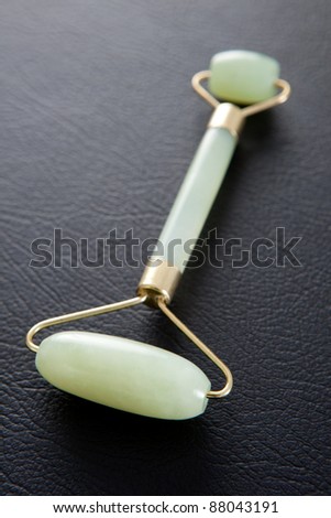 Jade roller acupuncture tool for facial massage