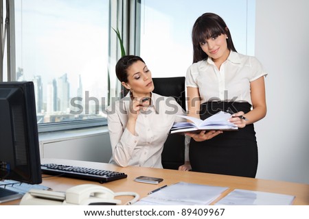 Business executive with personal assistant