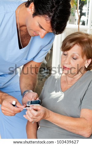 Free Blood Glucose Meter >> Male Nurse Measuring Glucose Level Blood Test Using Glucometer And Sample Strip Stock Photo ... Free Blood Glucose Meter >> Male Nurse Measuring Glucose Level Blood Test Using Glucometer And Sample Strip Stock Photo ...