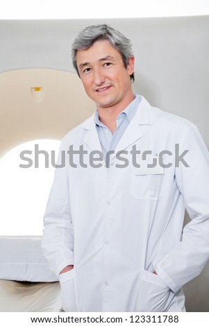 Radiologist Standing With Hands In Pockets