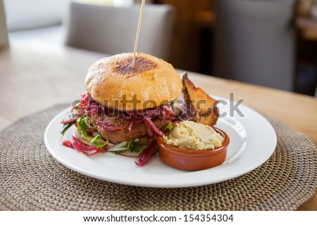 Detail of vegetarian falafel burger in restaurant