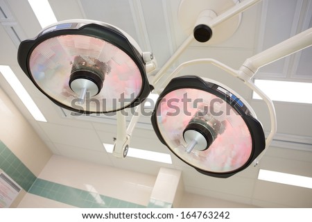 Low angle view of overhead lights in operation room