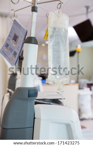 Fluid bag hanging on dialysis machine in chemo room at hospital
