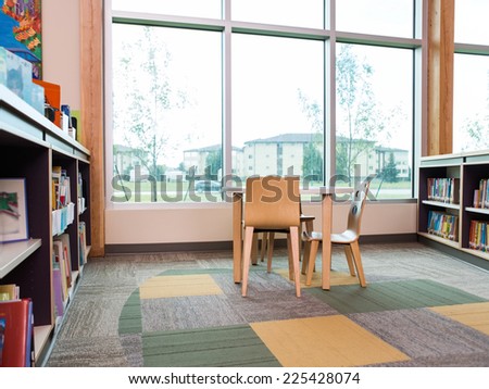 Interior of library with bookshelves and seating arrangement