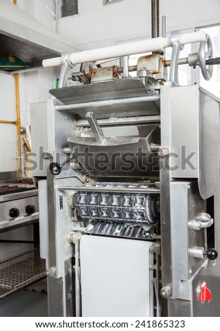 Ravioli pasta maker in commercial kitchen