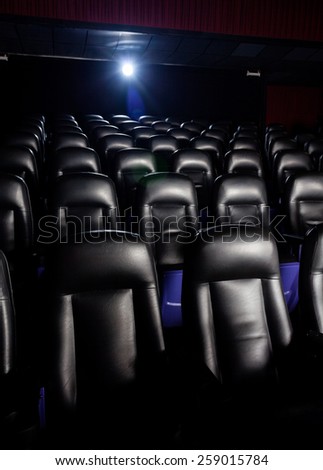 Projector light in empty cinema theater
