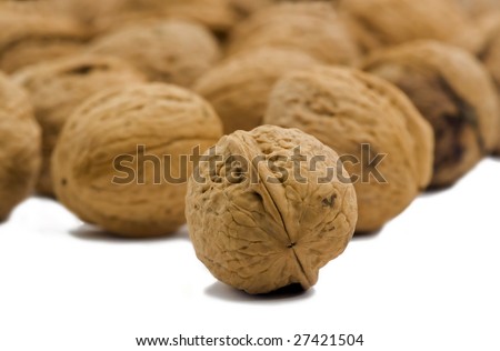 Close up shot of walnuts on white background