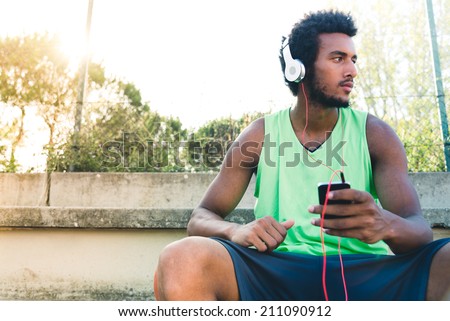 Black boy listening music Black boy listening music