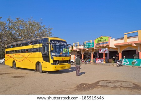 FEBRUARY 01, 2014, GUJARAT, INDIA - Intercity bus stays close to roadside cafe, passengers come to this cafe