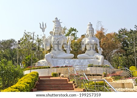 FEBRUARY 12, 2014, VISHAKHAPATNAM, ANDHRA PRADESH, INDIA - sculpture of the Divine Couple, Parvati and Shiva, on the top of mountain Kailasagiri