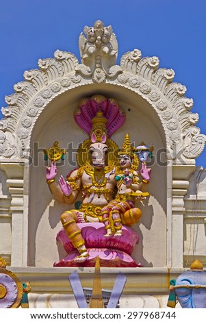 FEBRUARY 1, 2015, TIRUMALA, ANDHRA PRADESH, INDIA - Sculpture of Hayagriva, the horse incarnation of Vishnu, with his consort Lakshmi on the wall of the temple