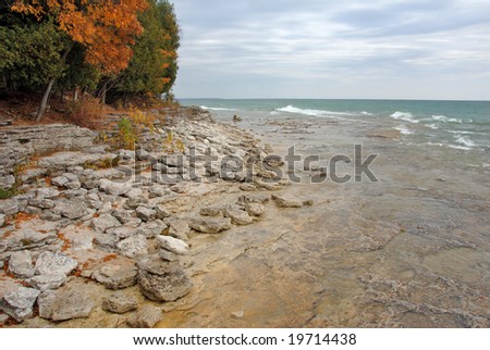 Waves along the rocky coast of Lake Michigan, Door County in the Autumn.