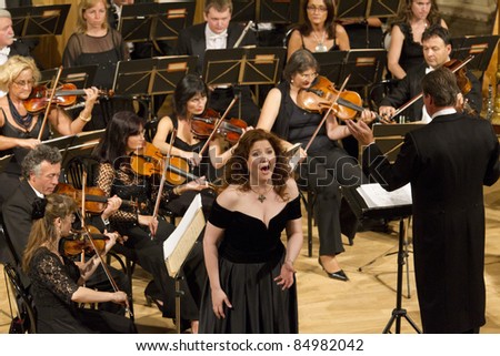 BUDAPEST, HUNGARY - SEPTEMBER 18: Klara Kolonits, singer of the Hungarian State Opera and the Danube Symphonic Orchestra on the stage of ELTE University on September 18, 2011 in Budapest, Hungary.