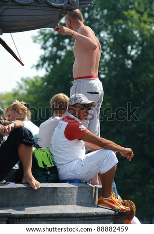 AMSTERDAM, NETHERLANDS - AUGUST 08: Unidentified people took part in the annual Amsterdam Gay Pride parade to support the LGBT rights, on august 8, 2004 in Amsterdam, Netherlands.