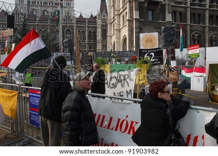 BUDAPEST, HUNGARY - OCTOBER 22: Unidentified people participate the demonstration against the social politics of Hungarian government before the Parliament on October 22, 2006 in Budapest, Hungary.