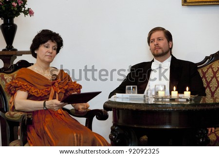 BUDAPEST, HUNGARY - MARCH 18: Andras Barlay Hungarian opera singer (r) at Pesterzsebet Art Gallery on March 18, 2010 in Budapest, Hungary.