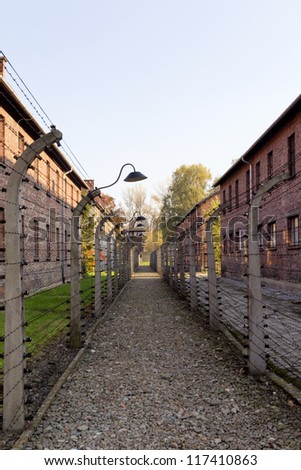 OSWIECIM, POLAND - OCTOBER 22: Electric fence in Auschwitz I, a former Nazi extermination camp on October 22, 2012 in Oswiecim. It was the biggest nazi concentration camp in Europe.