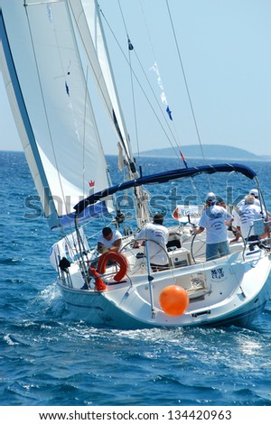 HVAR, CROATIA - MAY 20: Unidentified people participate the Republic Cup international sailing competition on the Adriatic sea on May 20, 2003 in Hvar, Croatia.