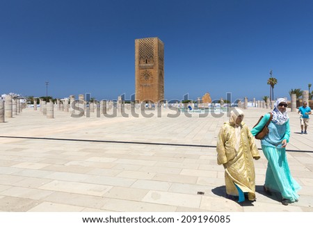 RABAT, MOROCCO - JULY 24 : People in front of the Hassan Tower and Mausoleum of Mohammed V. Mausoleum contains tombs of late King Hassan II and Prince Abdallah. On July 24, 2014 in Rabat, Morocco