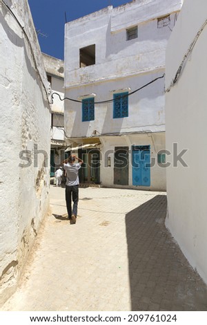 MULAY IDRISS, MOROCCO - JULY 22: Man on the street on July 22, 2014 in Mulay Idriss. King Moulay Idriss I arrived here in 789, bringing with him the religion of Islam, and starting a new dynasty.