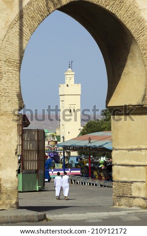 FEZ, MOROCCO - JULY 19: People in the medina on July 19, 2014 in Fez, Morocco.The medina is listed as a UNESCO World Heritage Site and is believed to be one of the world's largest car-free urban areas