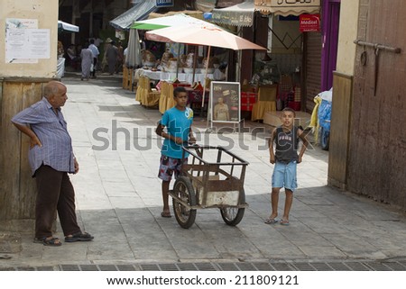 FEZ, MOROCCO - JULY 19: Unidentified people in mellah on July 19, 2014 in Fez, Morocco. The medina is listed as a UNESCO World Heritage Site.