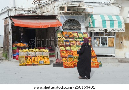 BIZERTE, TUNISIA - FEBRUARY 6: Arab woman shopping in the medina of the city on February 6, 2009 in Bizerte, Tunisia. Bizerte is known as the oldest and most European city in Tunisia.