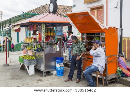 SALENTO, COLOMBIA - OCTOBER 25, 2015: Unidentified people on a street in Salento. Salento is a sleepy little town in QuindÃ­o department, in the Zona Cafetera region of Colombia.