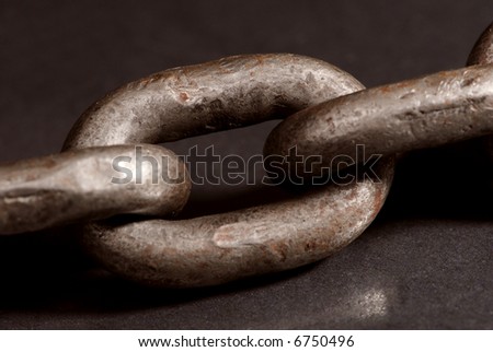 Old weathered industrial steel chain.