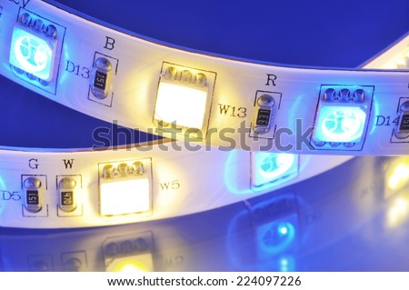 macro detail of a RGB-LED-stripe combined with warmwhite LEDs in colored spotlight