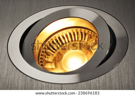 macro detail of a warmwhite COB-LED in aluminum lamp socket