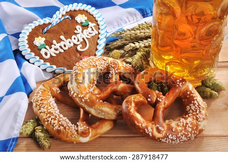 Oktoberfest - original bavarian gingerbread heart with Oktoberfest beer mug and soft pretzels from Germany