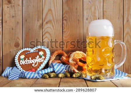 original bavarian Oktoberfest gingerbread heart with beer mug and soft pretzels from Germany