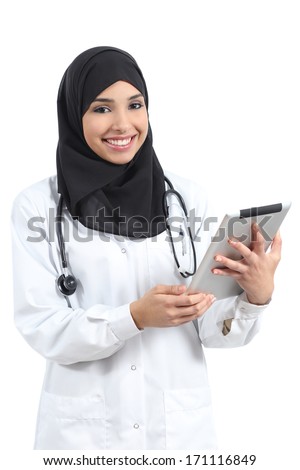 Arab doctor woman with a tablet looking at camera isolated on a white background Arab doctor woman with a tablet looking at camera isolated on a white background