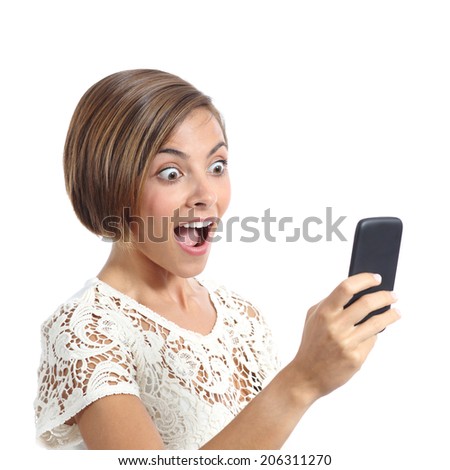 Happy woman surprised looking her smart phone isolated on a white background