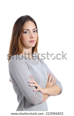 Portrait of an angry serious woman with folded arms isolated on a white background