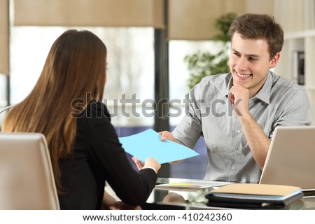 Businesspeople meeting and working and sharing documents in a desk at office